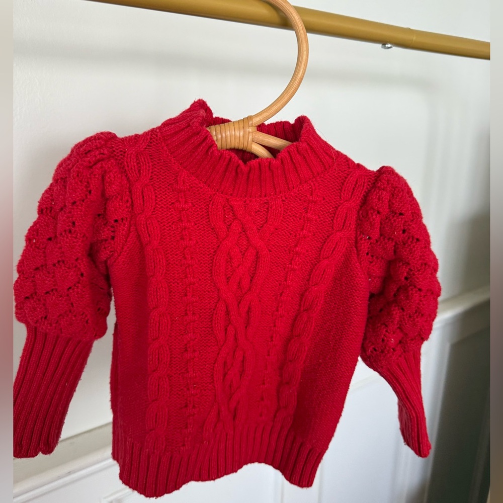The cutest red Janie and Jack sweater in excellent used condition